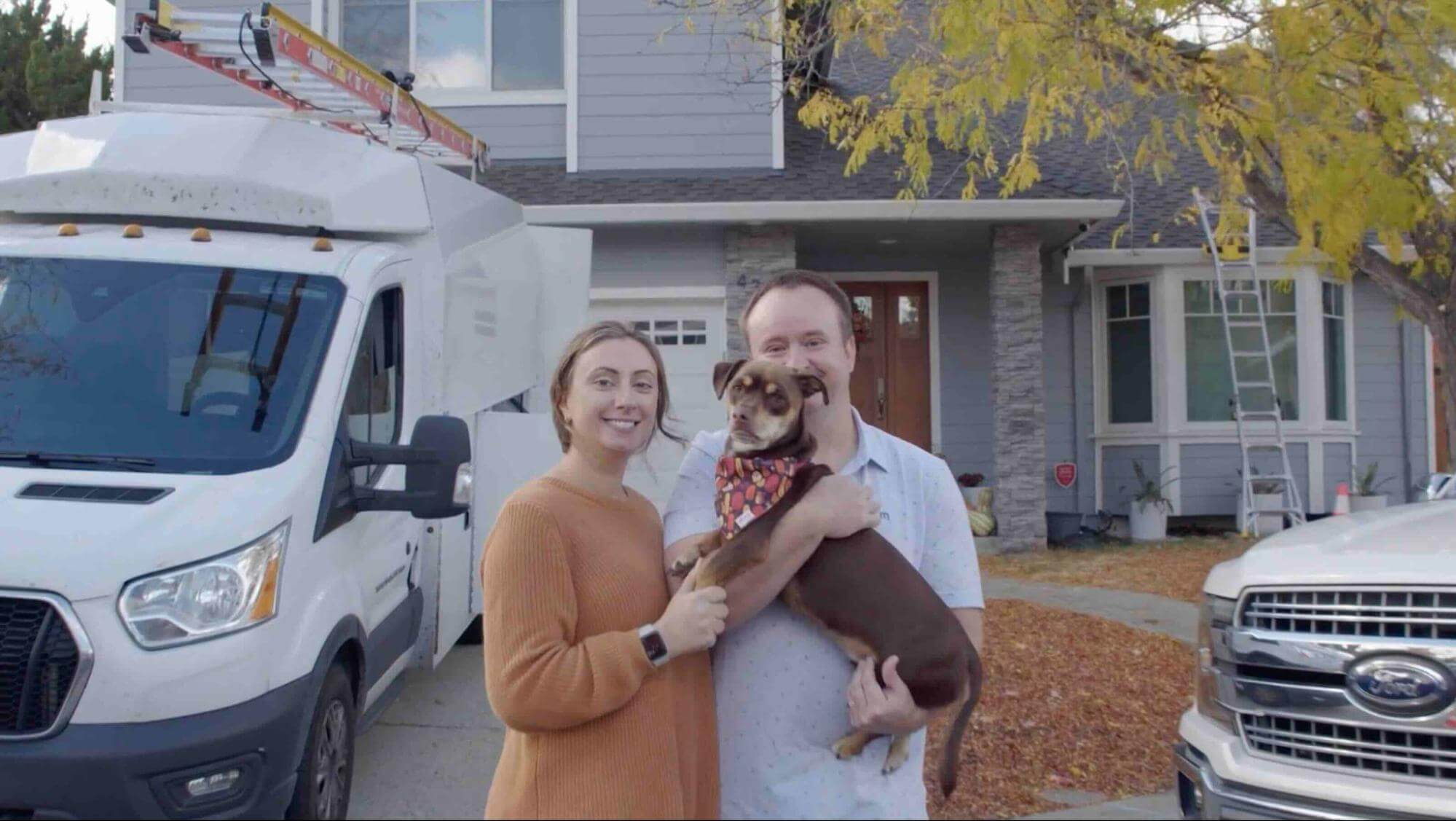 Happy family with their solar-powered home